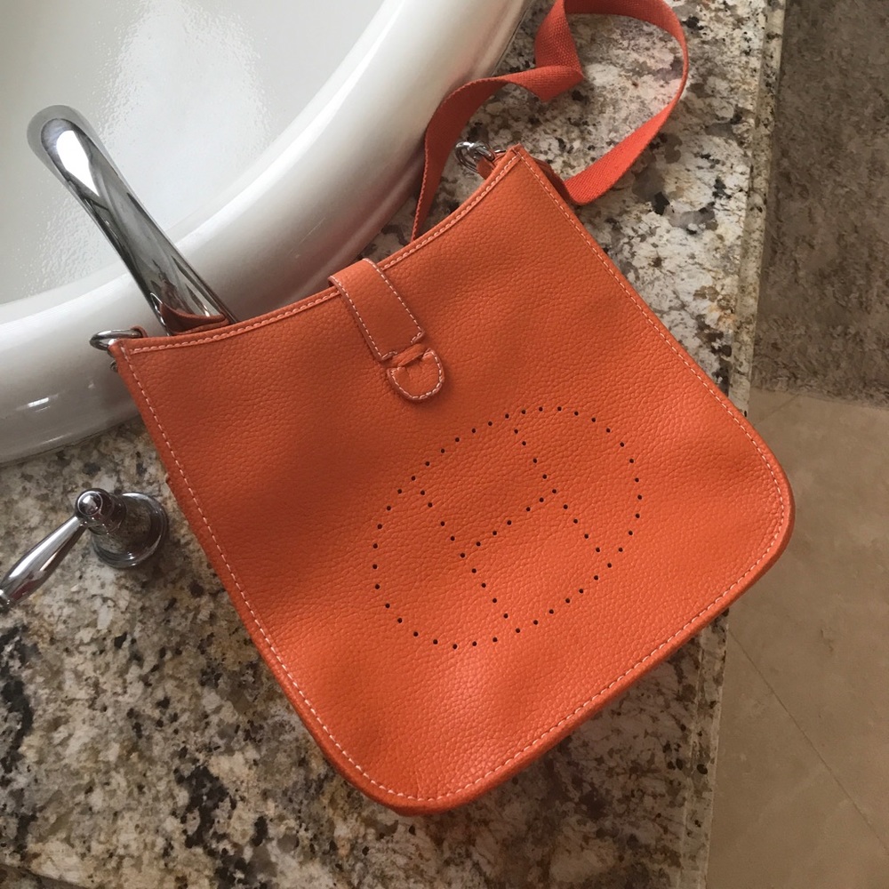 Orange cross body *** price reflects don't ask***