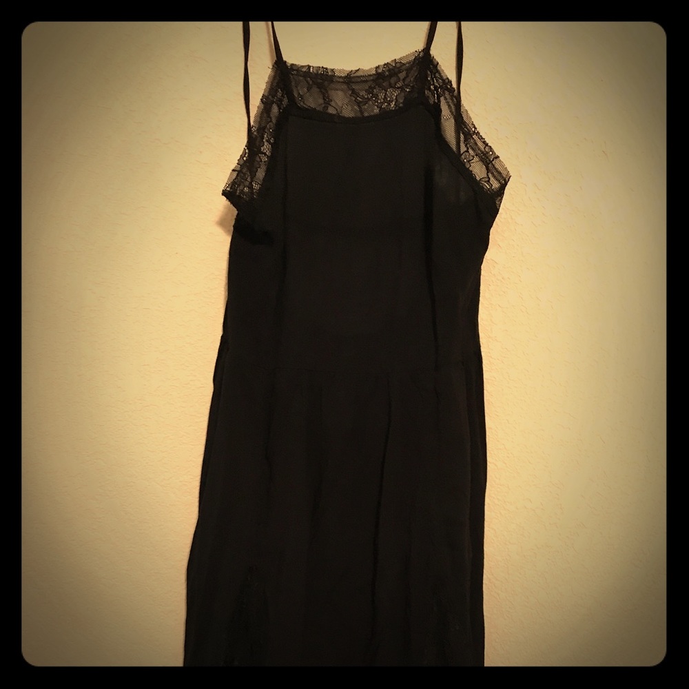 Strappy black dress with lace detail