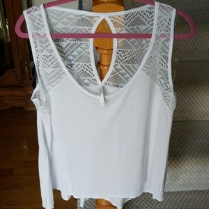 Loose white tank top with detailing on back