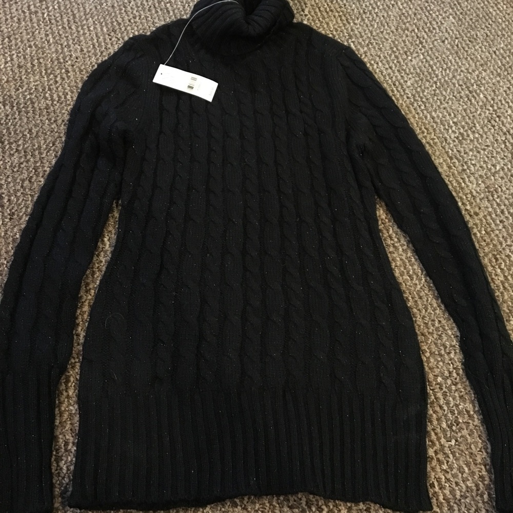 Black turtleneck bleak new with sparkle in it.