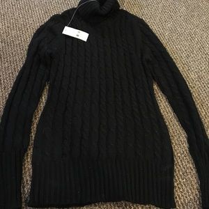 Black turtleneck bleak new with sparkle in it.