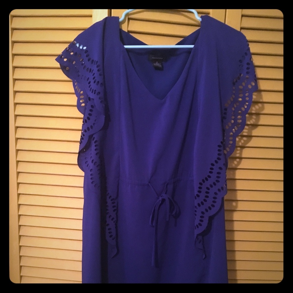 Navy boutique dress with ruffles.