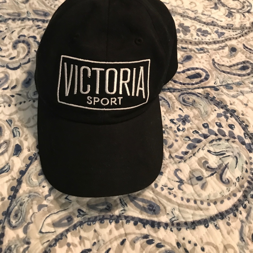 Black Hat with  Victoria Sport logo.