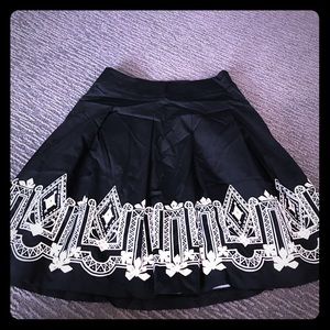 Black and white box pleat skirt