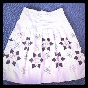 Tan and brown patterned pleated skirt
