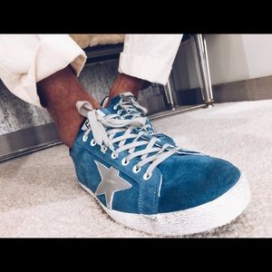 Golden goose sneakers.