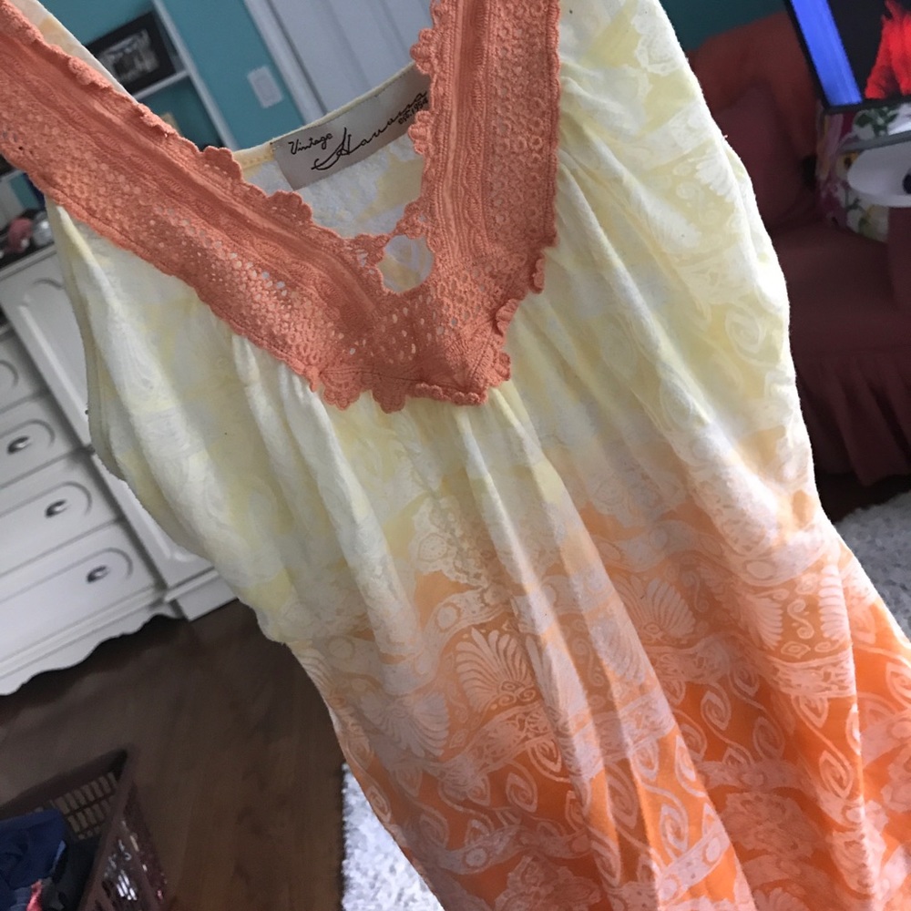Flowy orange and yellow tank top. Lace details.