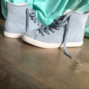 Blue tretorn high tops