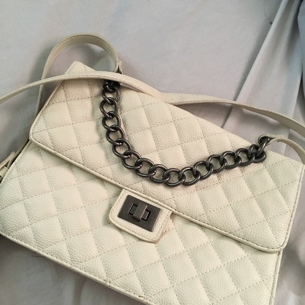 Cream colored bag everything is in good condition