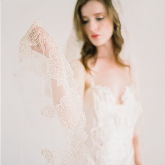 Brand new! Gorgeous handmade veil with gold trim!