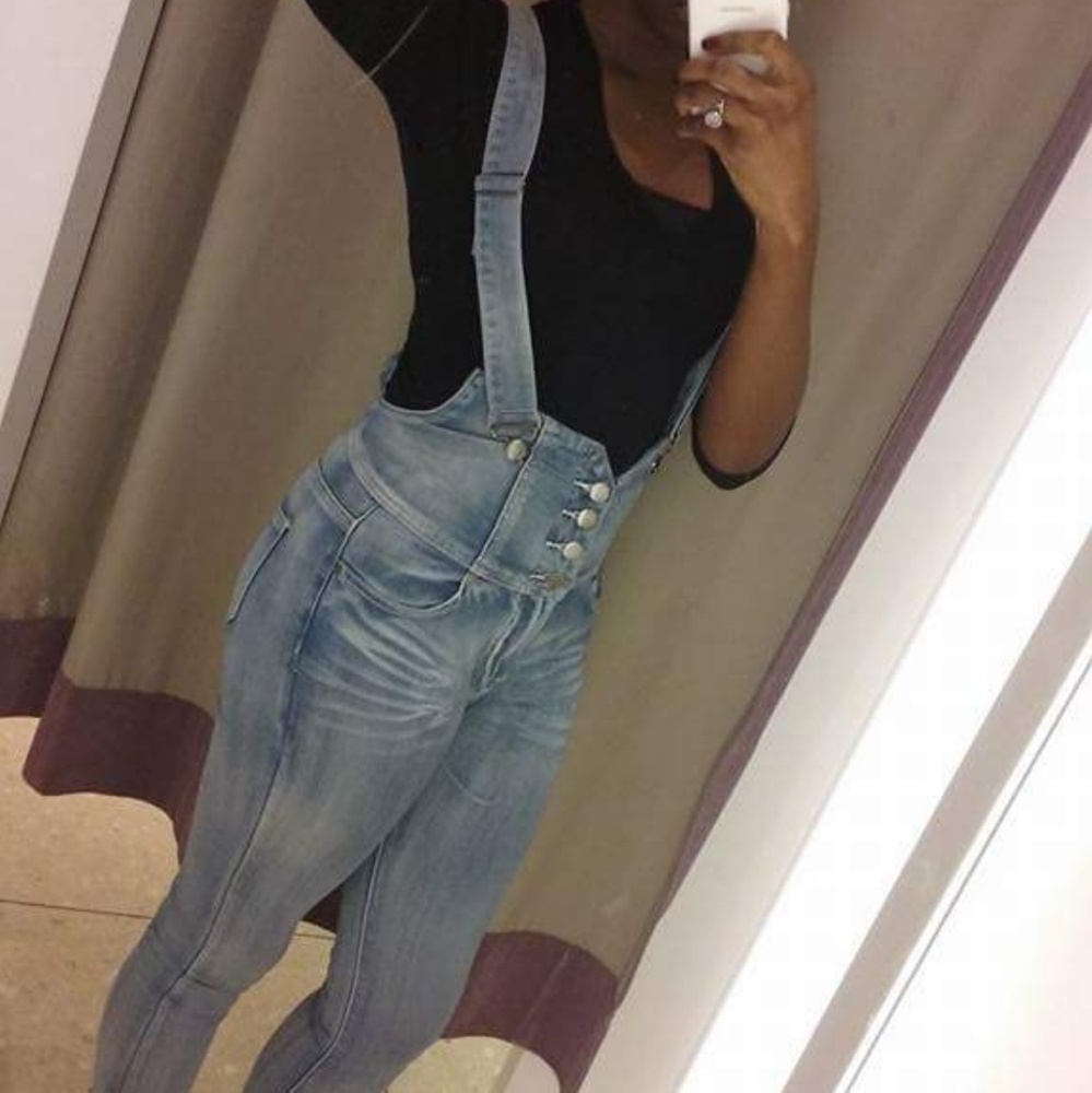 Light blue jeans with suspenders