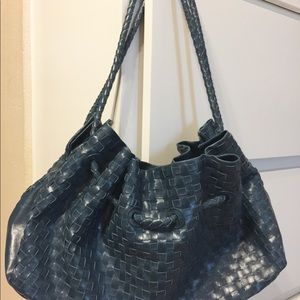 Teal woven bag. Very Bottega chic