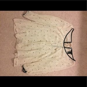 Sheer black and white polka dotted shirt