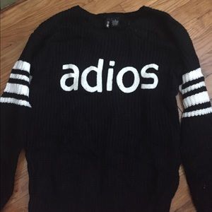 Black "adios" sweater