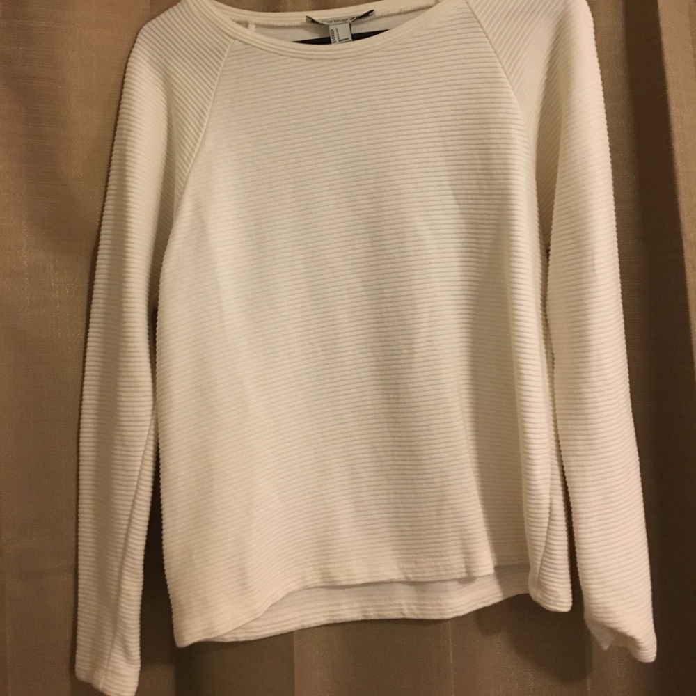 White ribbed sweater