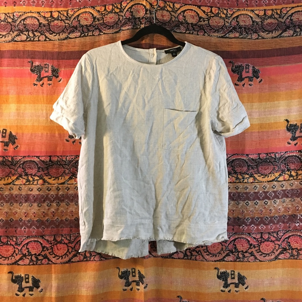 Cream white pocketed top
