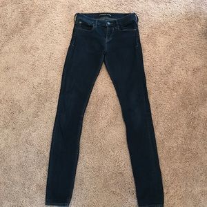 Express dark wash skinny jeans