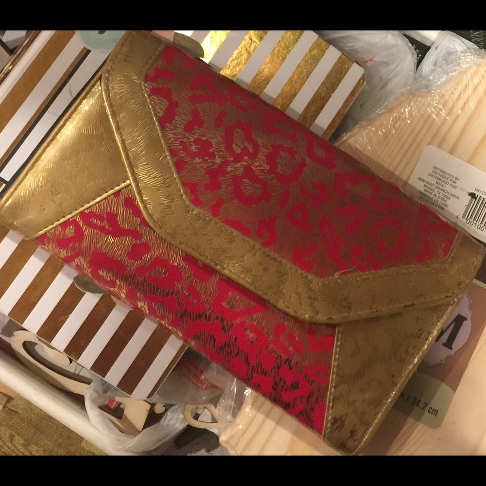 Red and gold leopard clutch