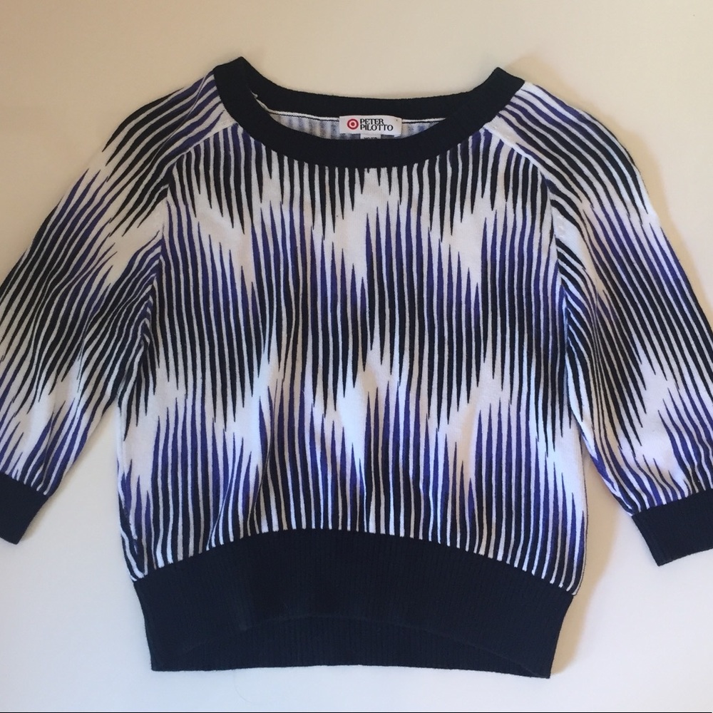 White top with blue and black streaks