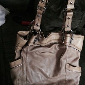 B. Makowsky leather and metal bag