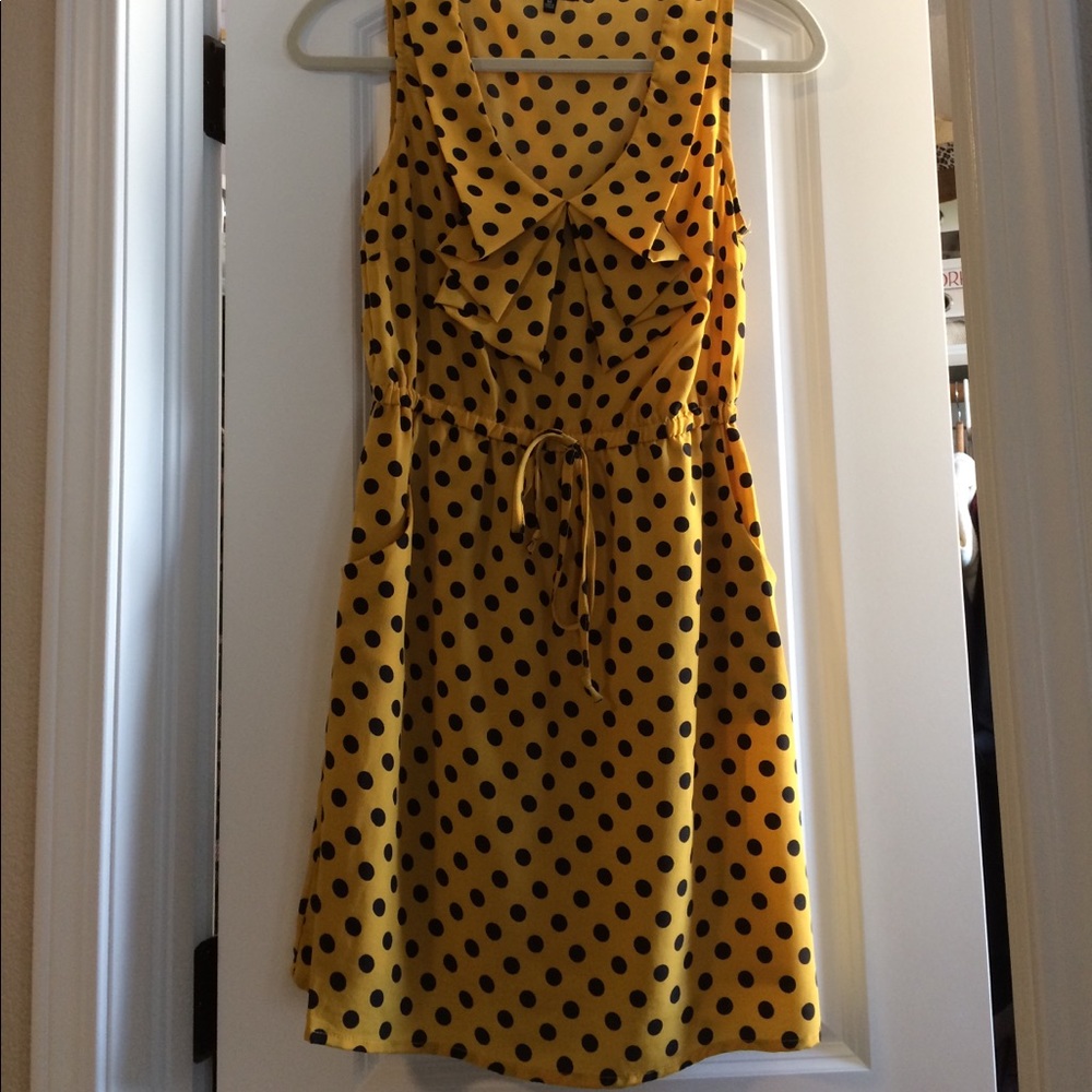 Yellow shift dress with navy blue polka dots