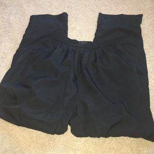 Black track pants with zipper