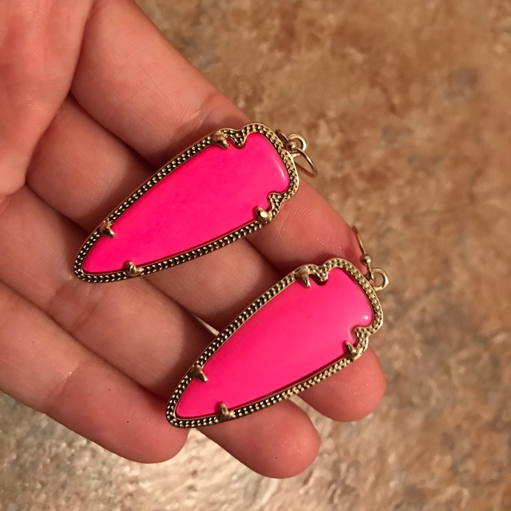Kendra Scott hot pink triangle earrings.