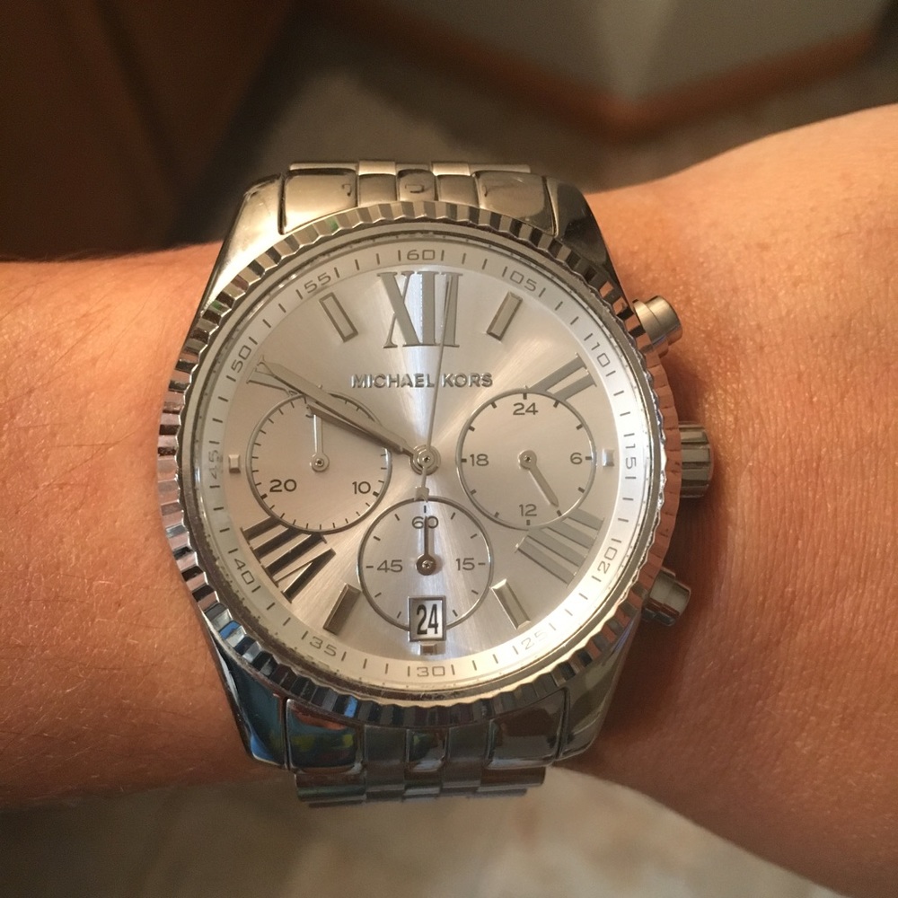 Michael Kors silver oversized watch.