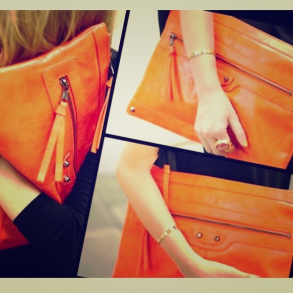 NWT ORANGE LEATHER CLUTCH COMES WITH DUSTBAG - Picture 1 of 2
