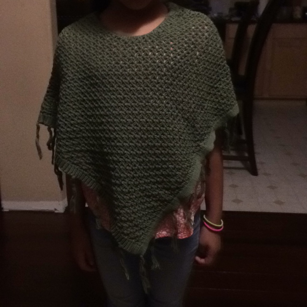 Cute crocheted pancho perfect for fall and winter