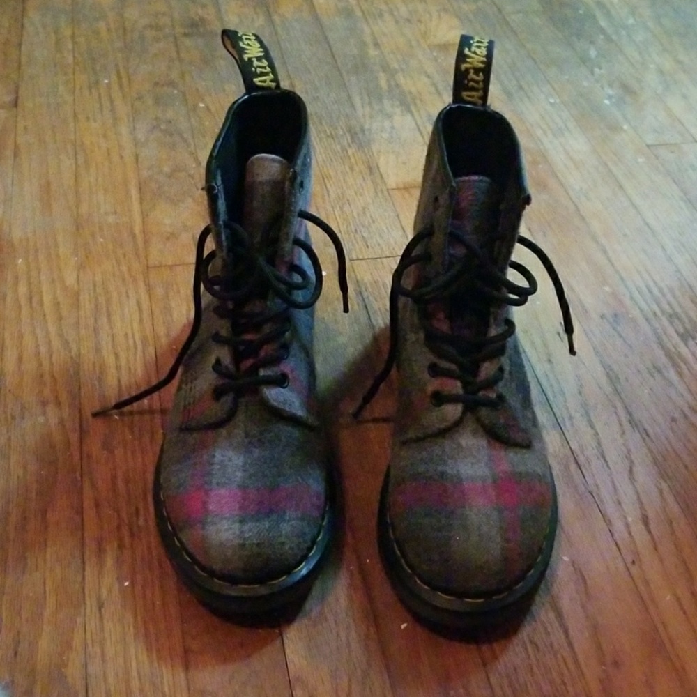 Gray and pink doc martens