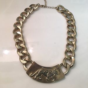 Gold chain with leopard detail