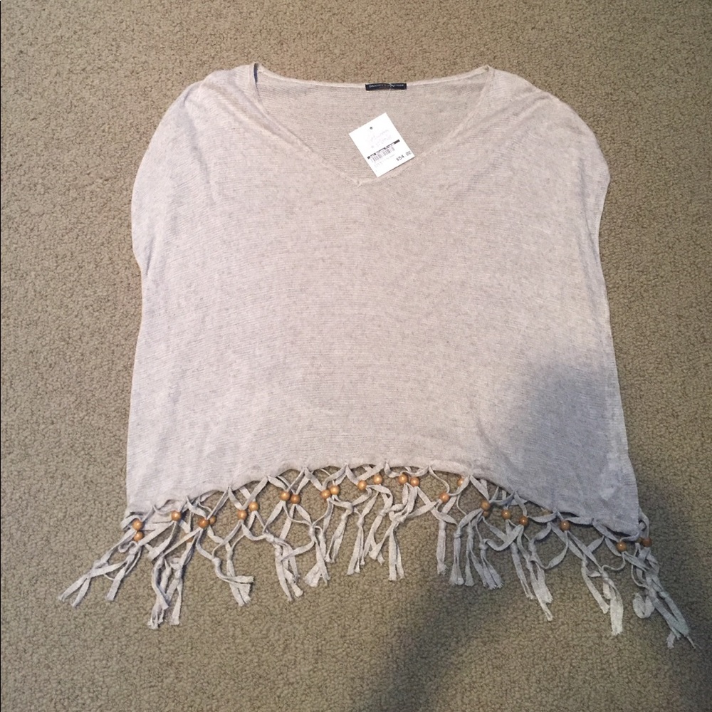 Baggy sweater with fringe