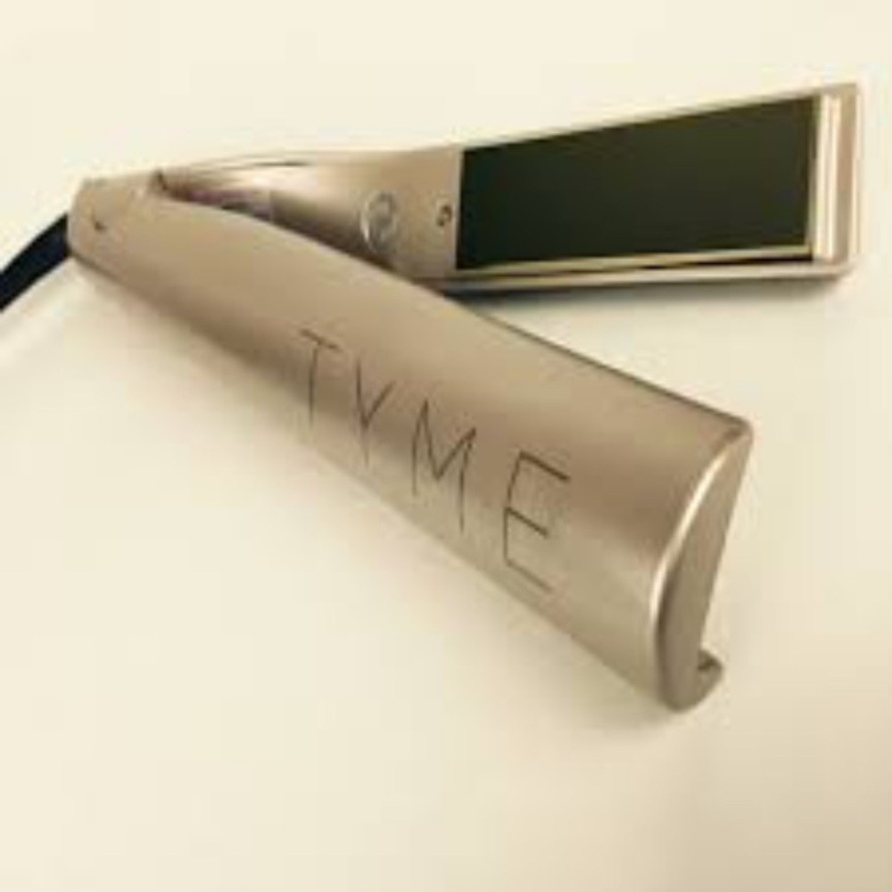 Brand new never opened tyme iron