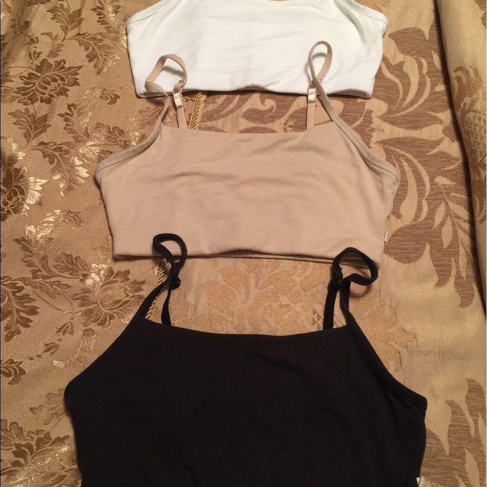Washed but never worn sports bras. Set of 3.