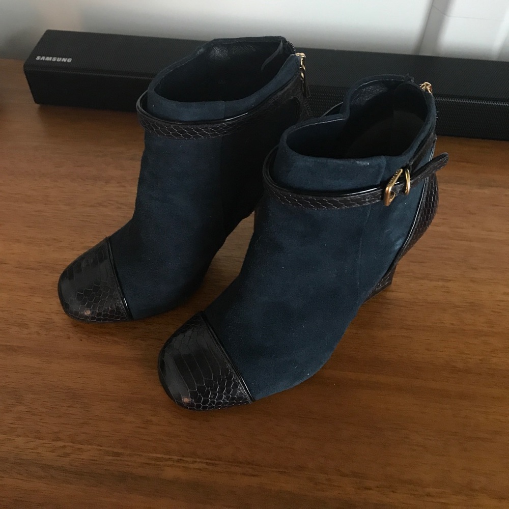 Navy Tory Burch booties, size 6m.