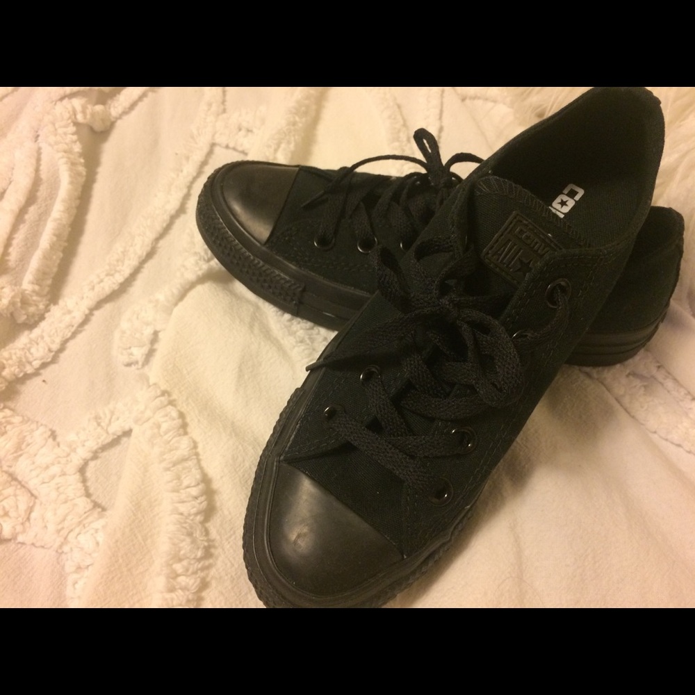 All black low top Converse