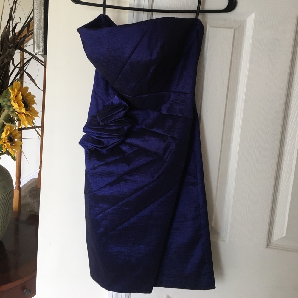 A royal blue cocktail strapless cocktail dress
