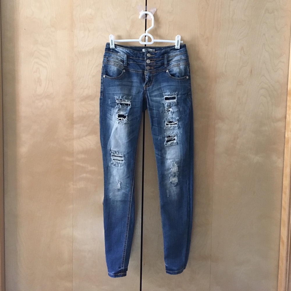 Mid waist ripped skinny jeans