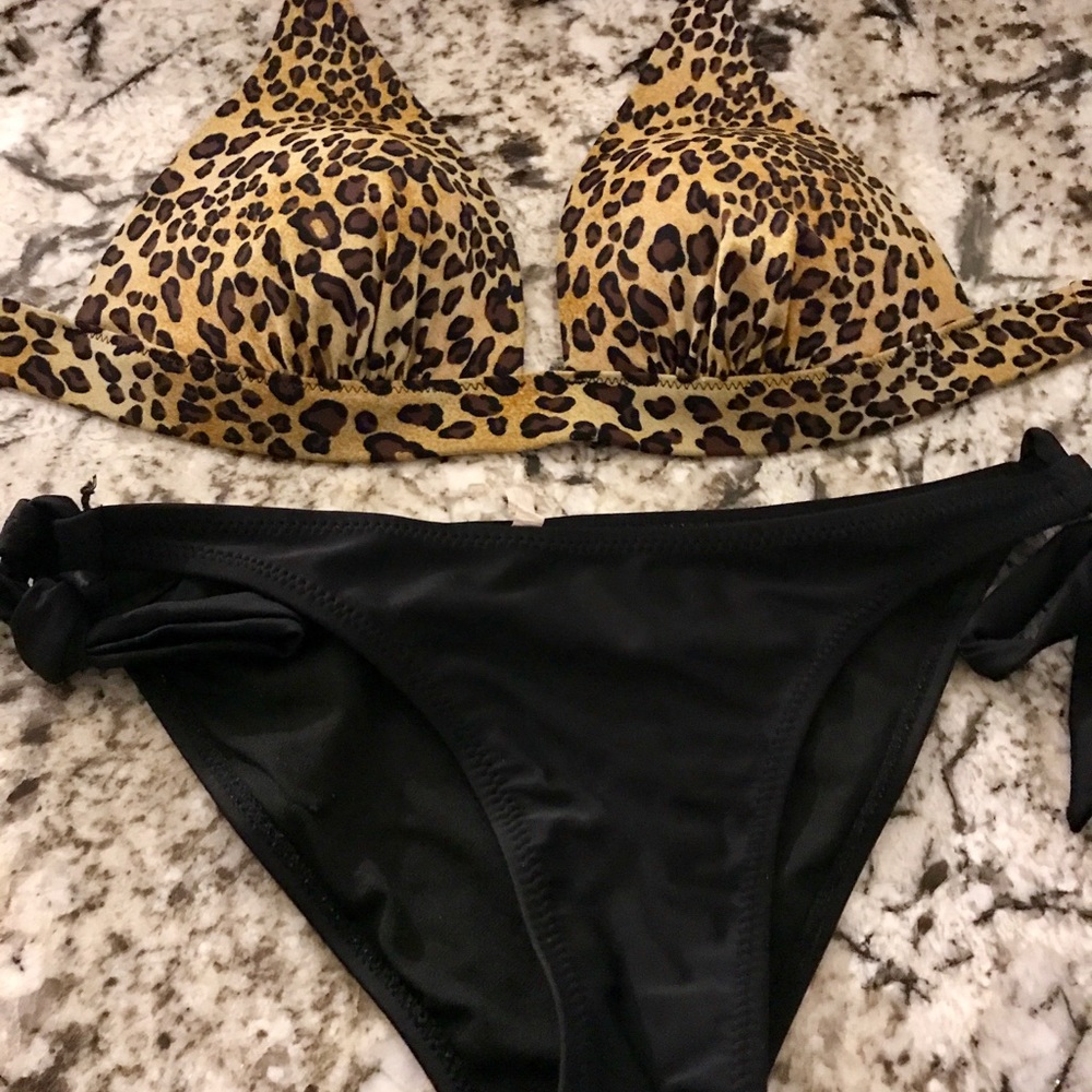 Victoria Secret bikini top and black bottoms.