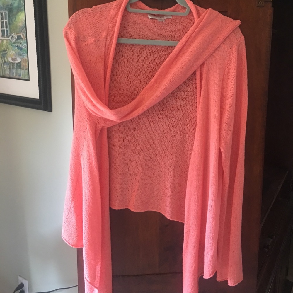 Bright orange summer weight sweater.