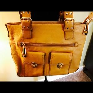 Tan purse with front pockets