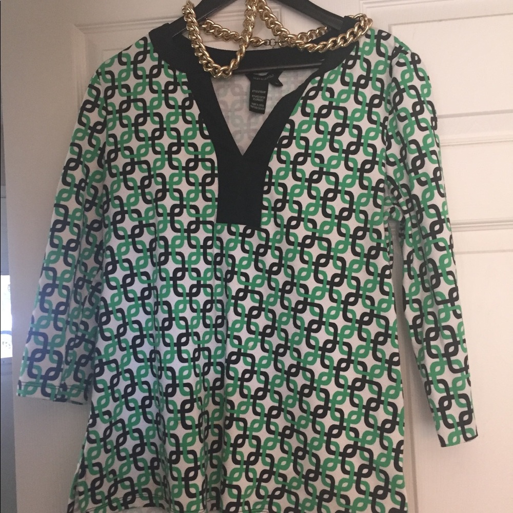 A tailored tunic top by Jules and Leopold.