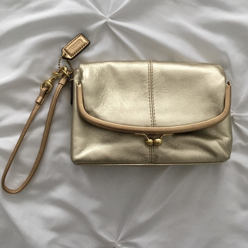 Coach gold wristlet clutch purse
