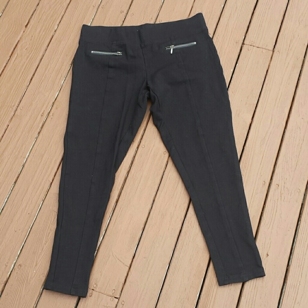 Black crop ponte ankle pants with zipper details