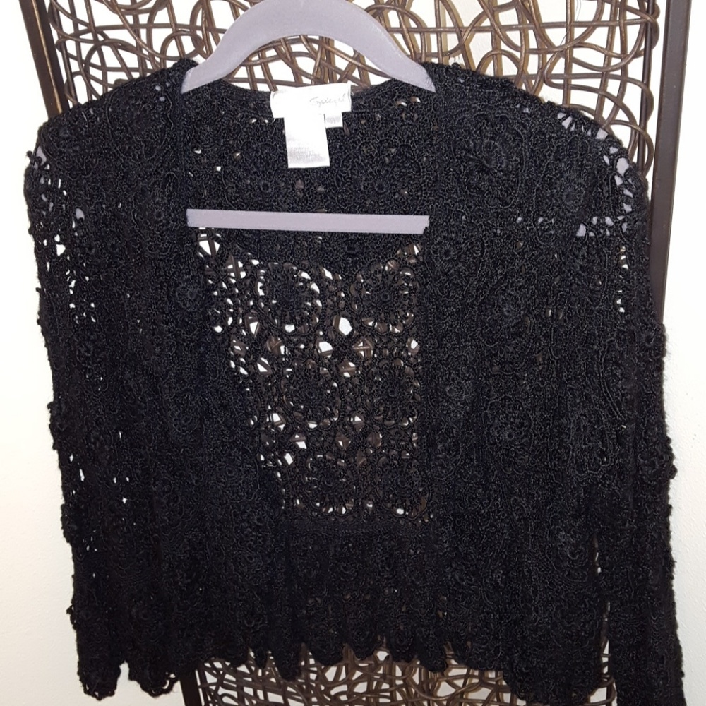 Black crochet style jacket. Bell sleeves.