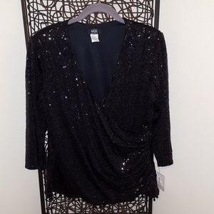 Black sequin top with beading on the bottom.