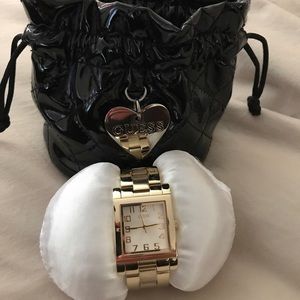 Selling 💯Auth. Gold Guess watch w/original pouch
