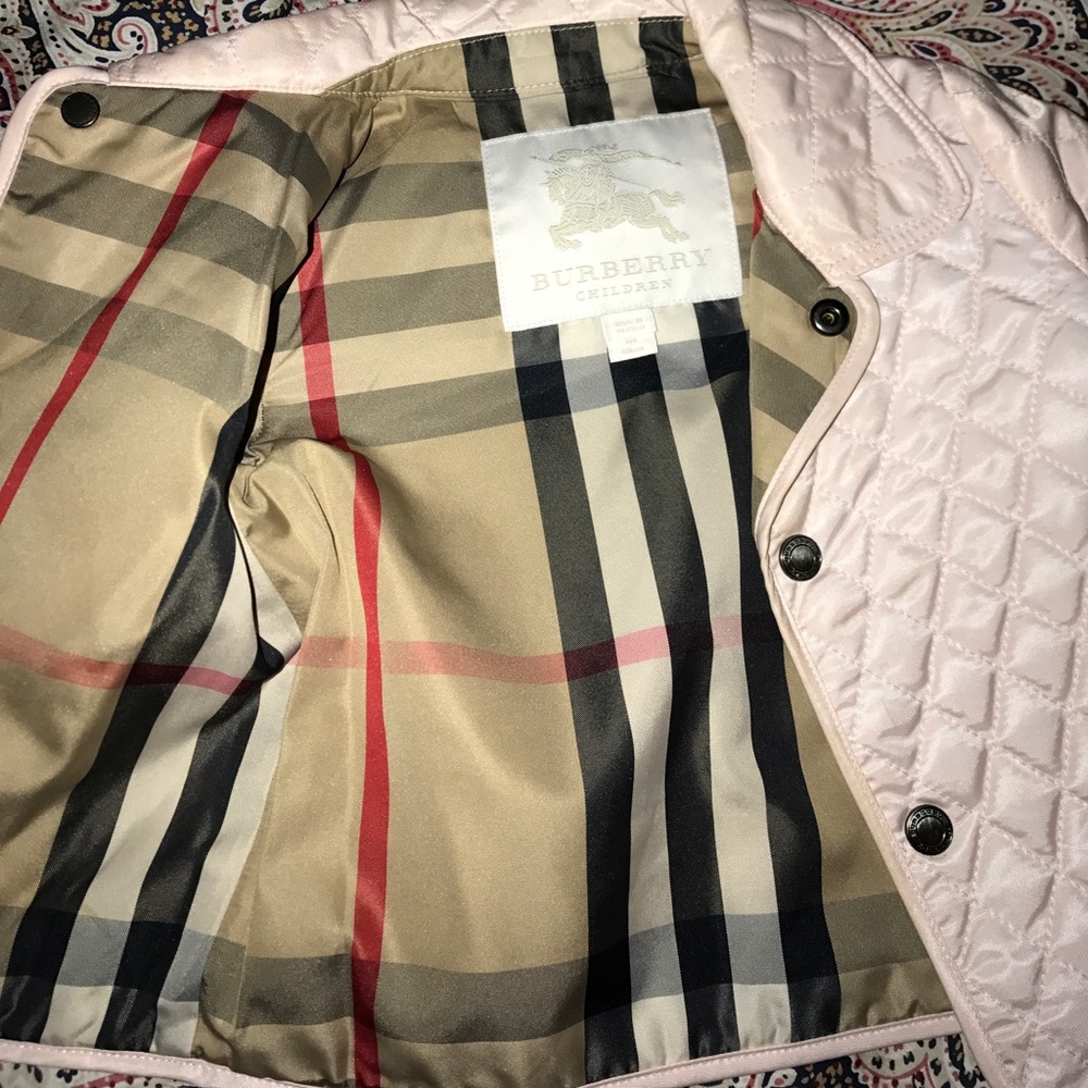 A  100% authentic Infant Burberry Coat