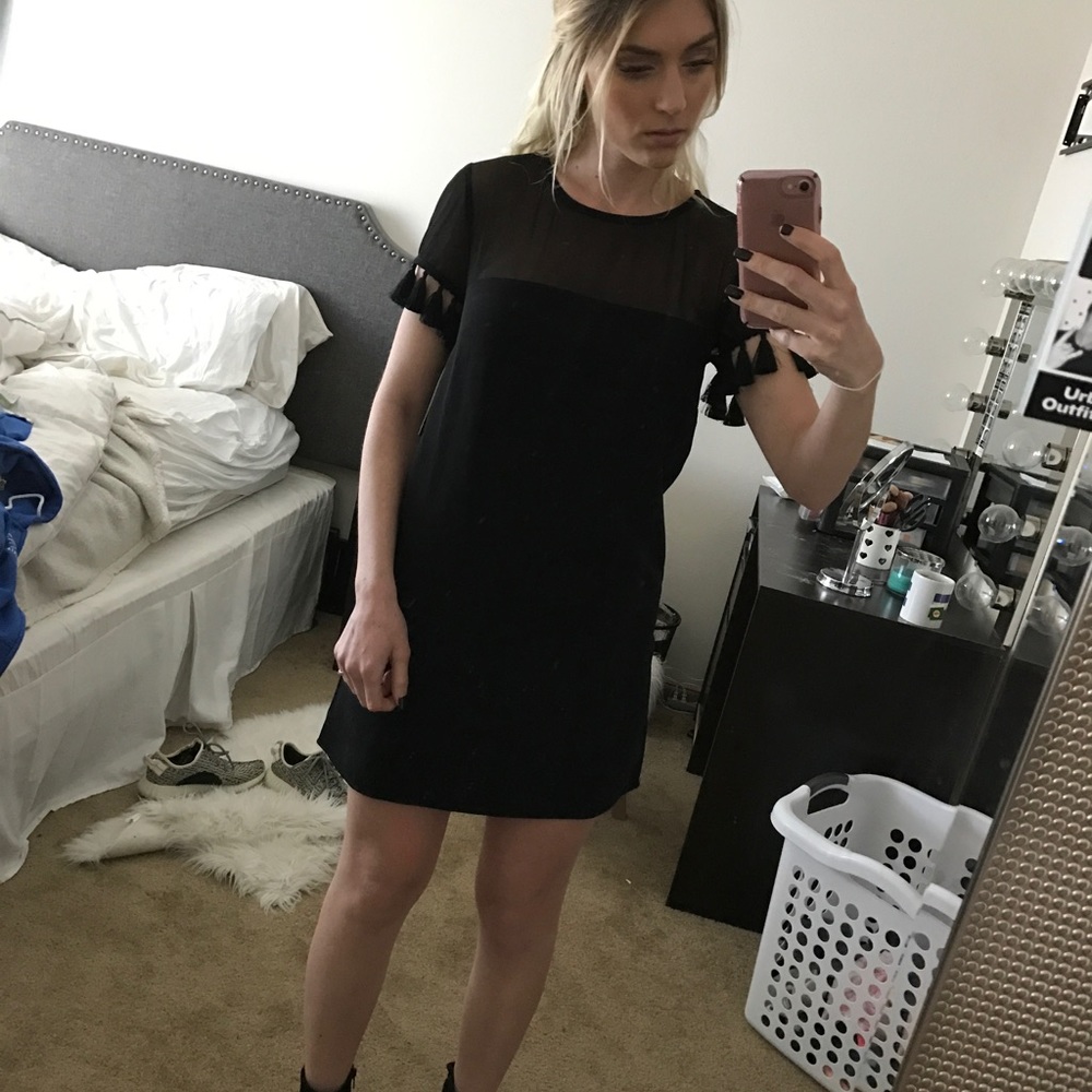 Black dress with tassels